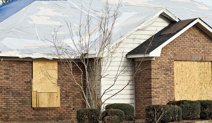 Board-up service on window and garage door