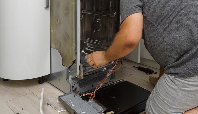 Electrician restoring an electronic machine