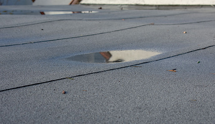 Ponding rain water on flat roof