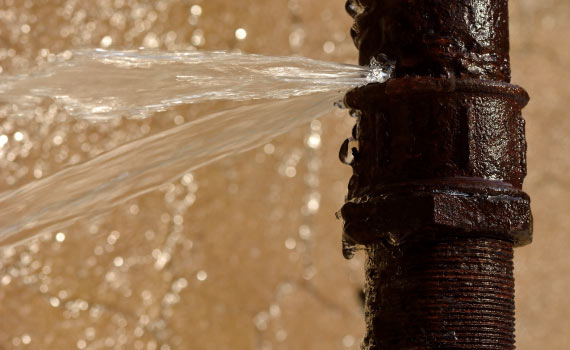 water leaking from burst pipe